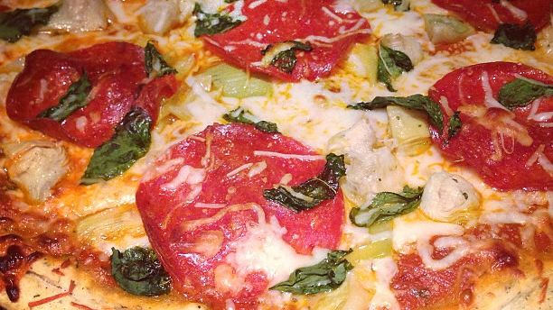 The Best Way to Reheat Pizza Without Losing Its Crispness