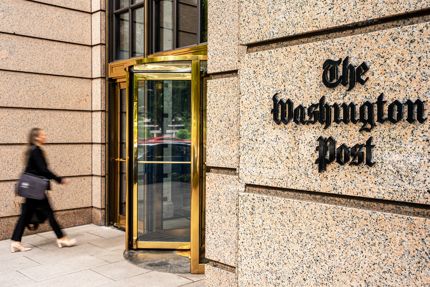 Washington Post begins sweeping layoffs as it cuts costs