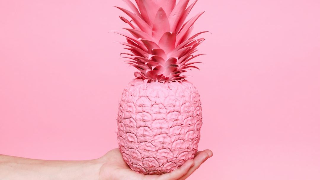 What Is "Pink Pineapple"? The Bio-Hacked Fruit Taking Over Luxury Grocery Stores