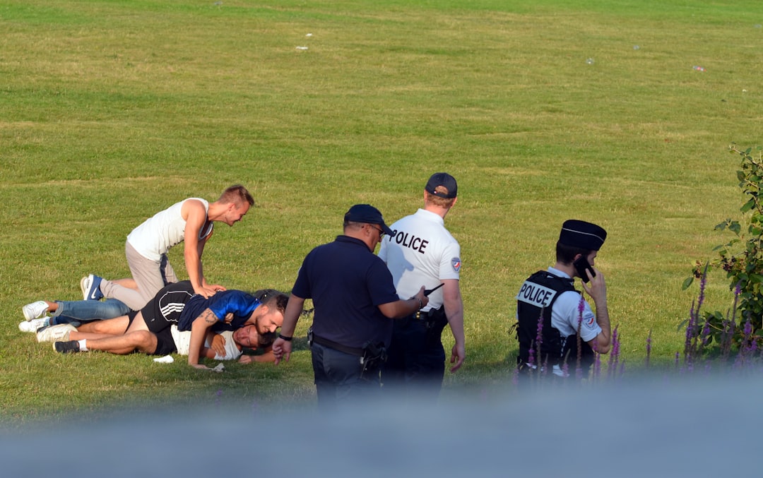 Ex-Dallas Cowboy Trysten Hill grins after arrest for allegedly assaulting pregnant woman