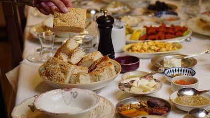 The Silent 'Bread Basket' Rule: 4 Ways You're Looking Unrefined at Dinner